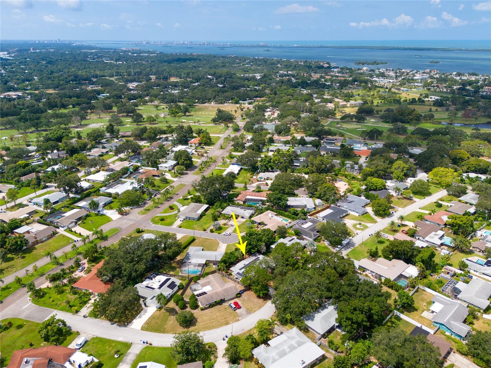 This aerial view looks a bit more Southwest and shows the Intracoastal Waterway and Gulf at the top and also portions of the Historic Dunedin Golf Club which is currently undergoing a multimillion dollar restoration and should reopon later this fall.