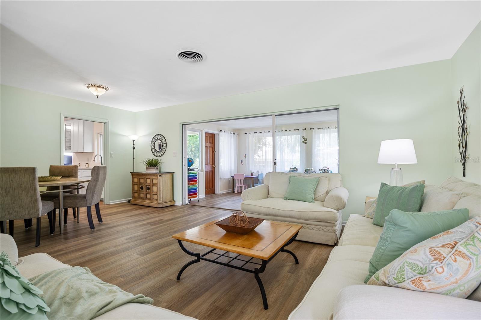 Gorgeous all new wood look Luxury Vinyl plank flooring runs throughout the home.