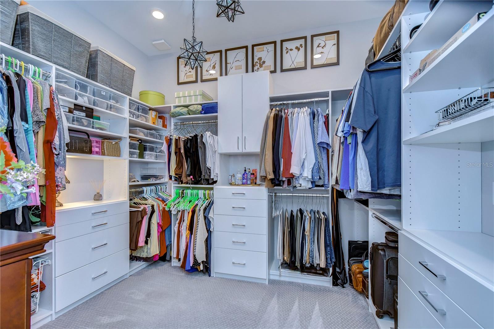 Custom designed primary bedroom closet (11x12)