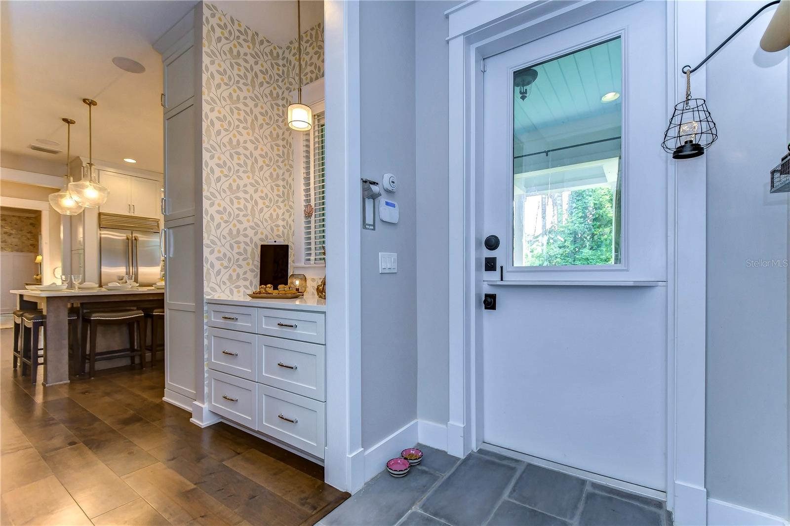 Entrance to side porch through Dutch Door off kitchen and laundry room