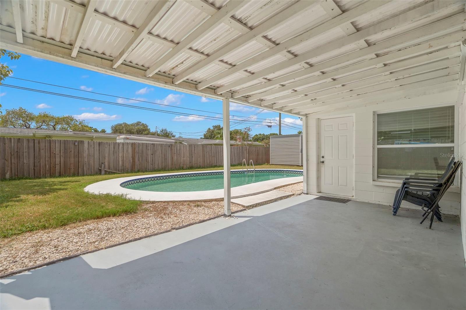 Covered patio & in-ground pool