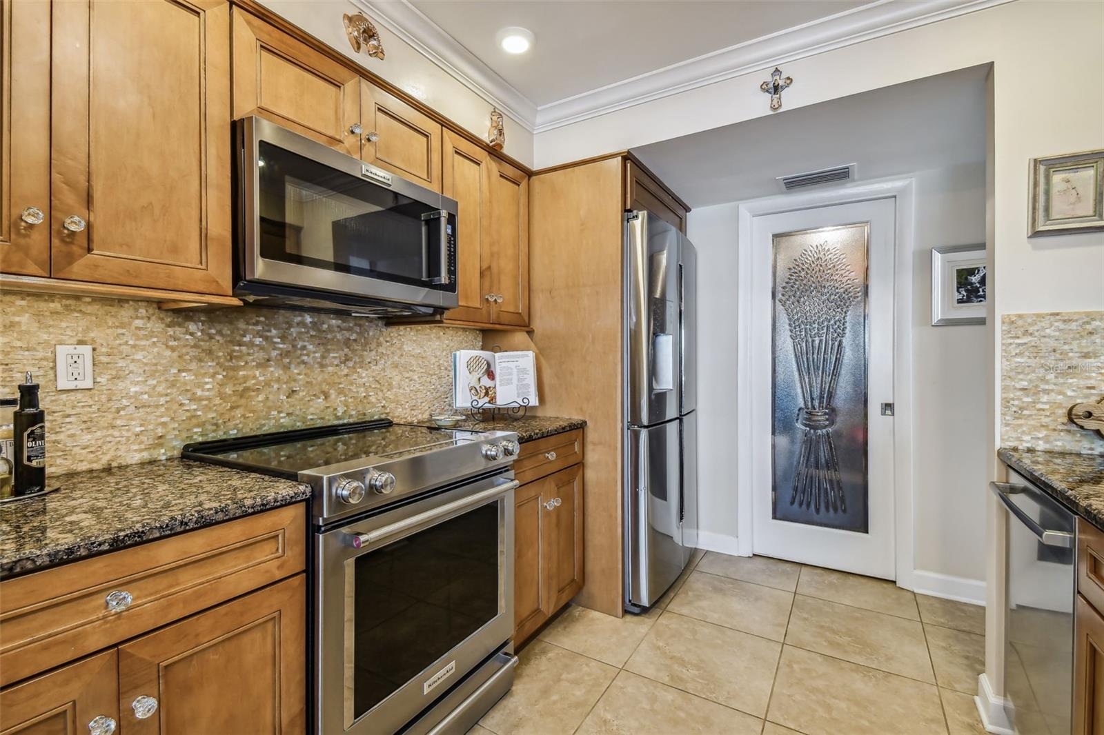 Kitchen with large walk-in pantry