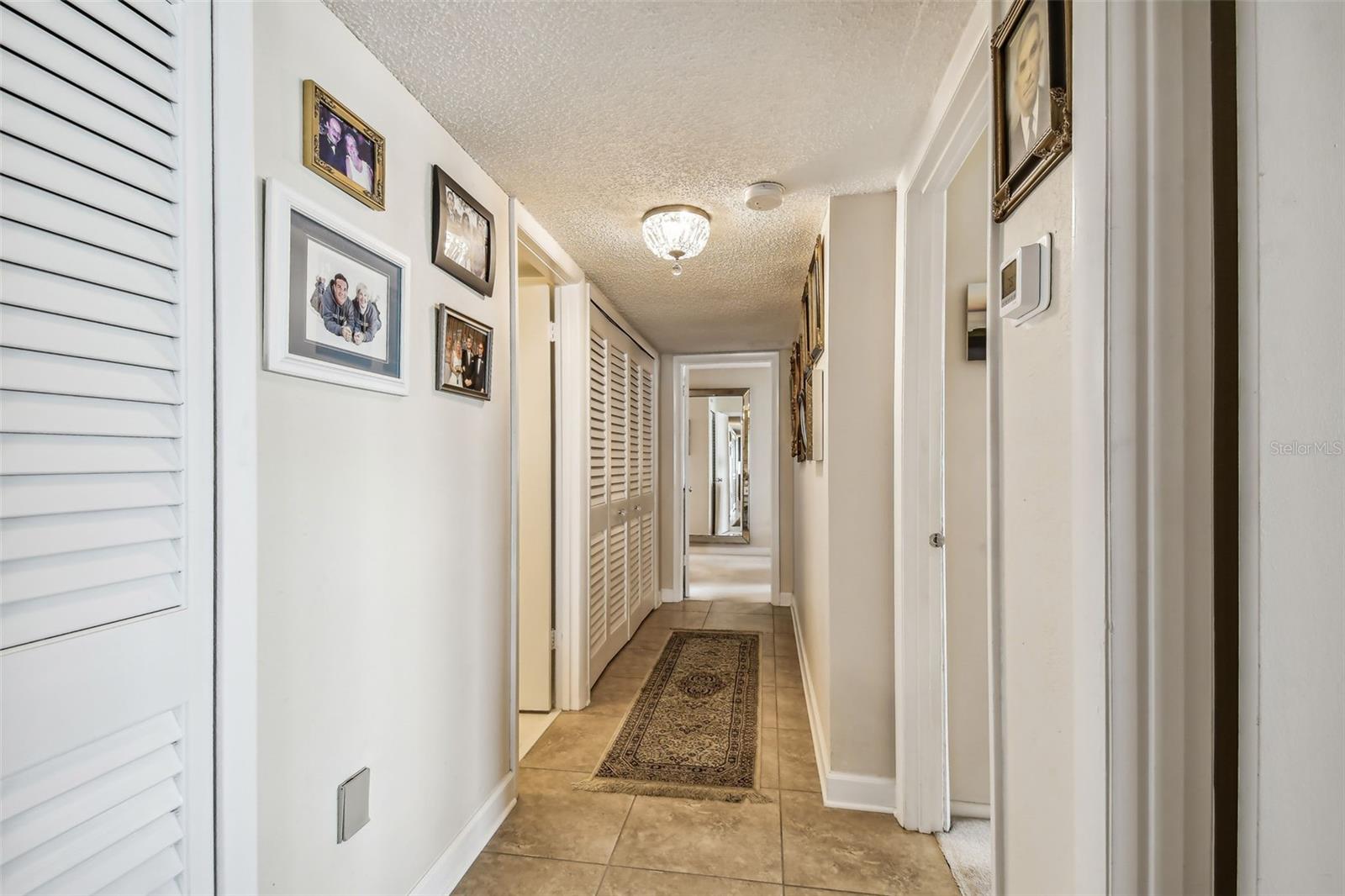 Hallway with in-unit laundry