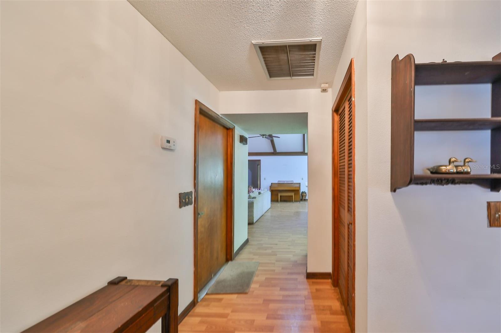 As you enter a foyer welcomes you.  Family room is straight ahead and the separate living room is to the right.