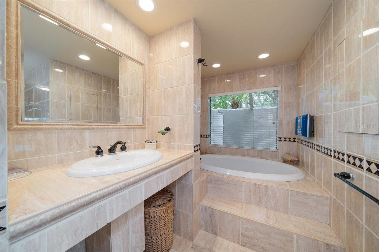 Jacuzzi tub in the primary bathroom