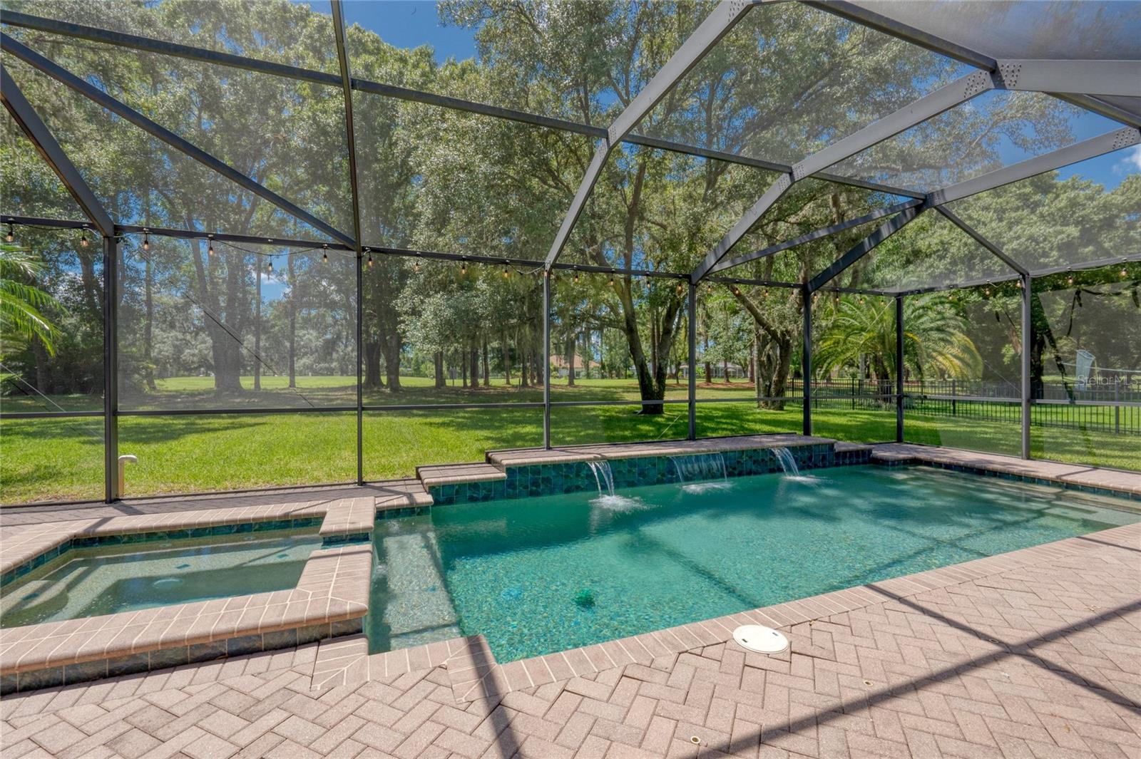 Spa & Pool in the back of the home