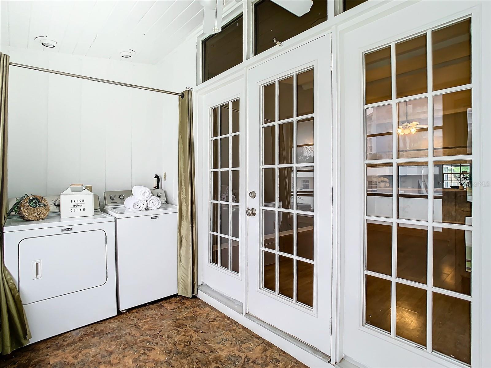 Private laundry at end of sunroom