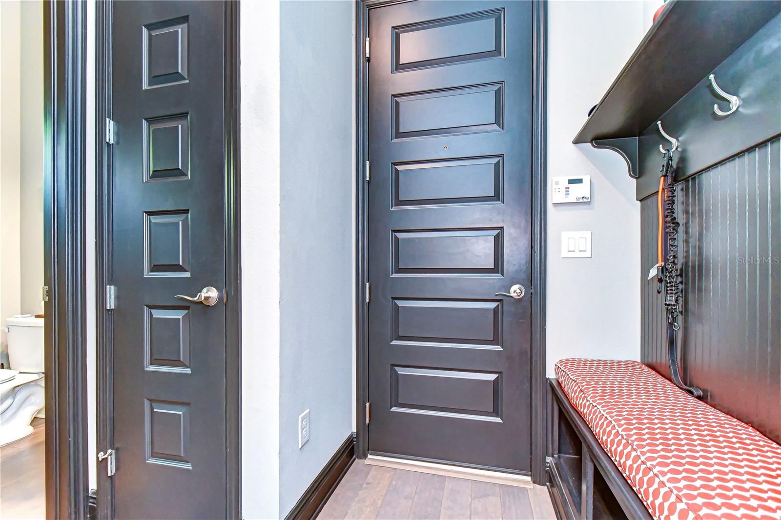 Garage entrance with mud-room storage!