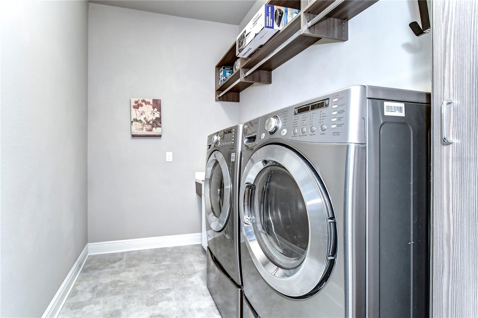 Laundry room with shelving!