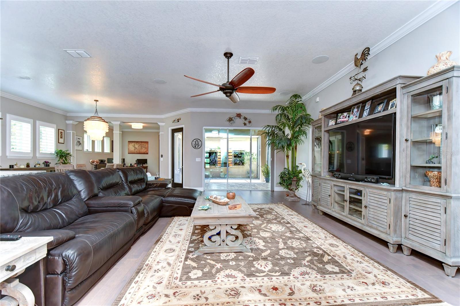 Great room with triple slider is the perfect space to spend family time!