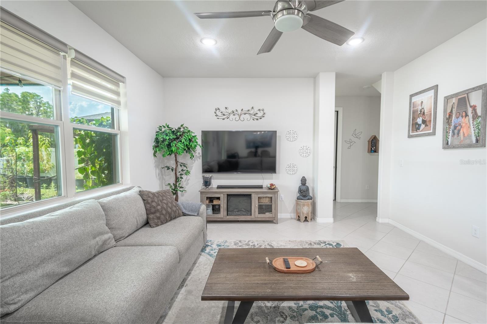 The family room features recessed lighting.