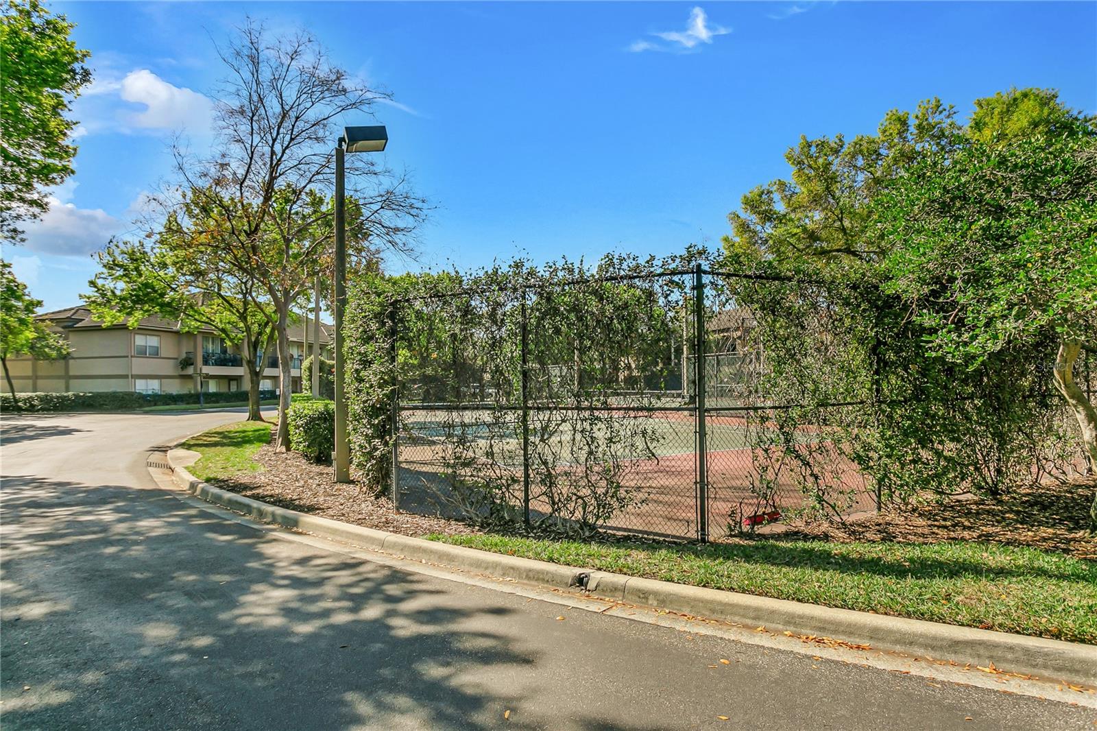 Besides the tennis courts, there's a fitness center for residents to enjoy.