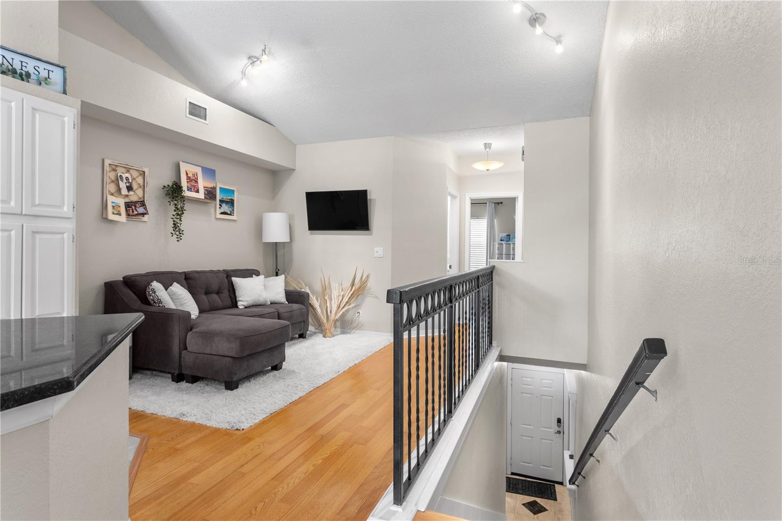 Once you get to the main level, you'll appreciate the high ceilings and open floorplan.