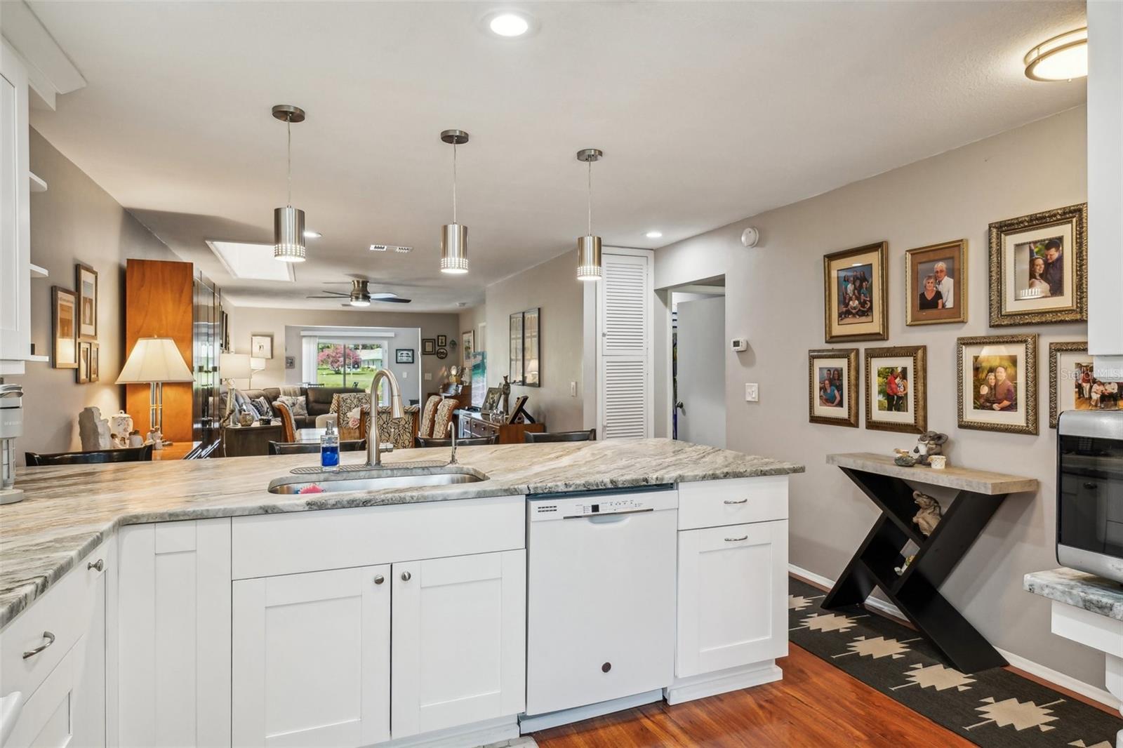 Door to the right leads to laundry room. guest bedroom and guest bathroom.