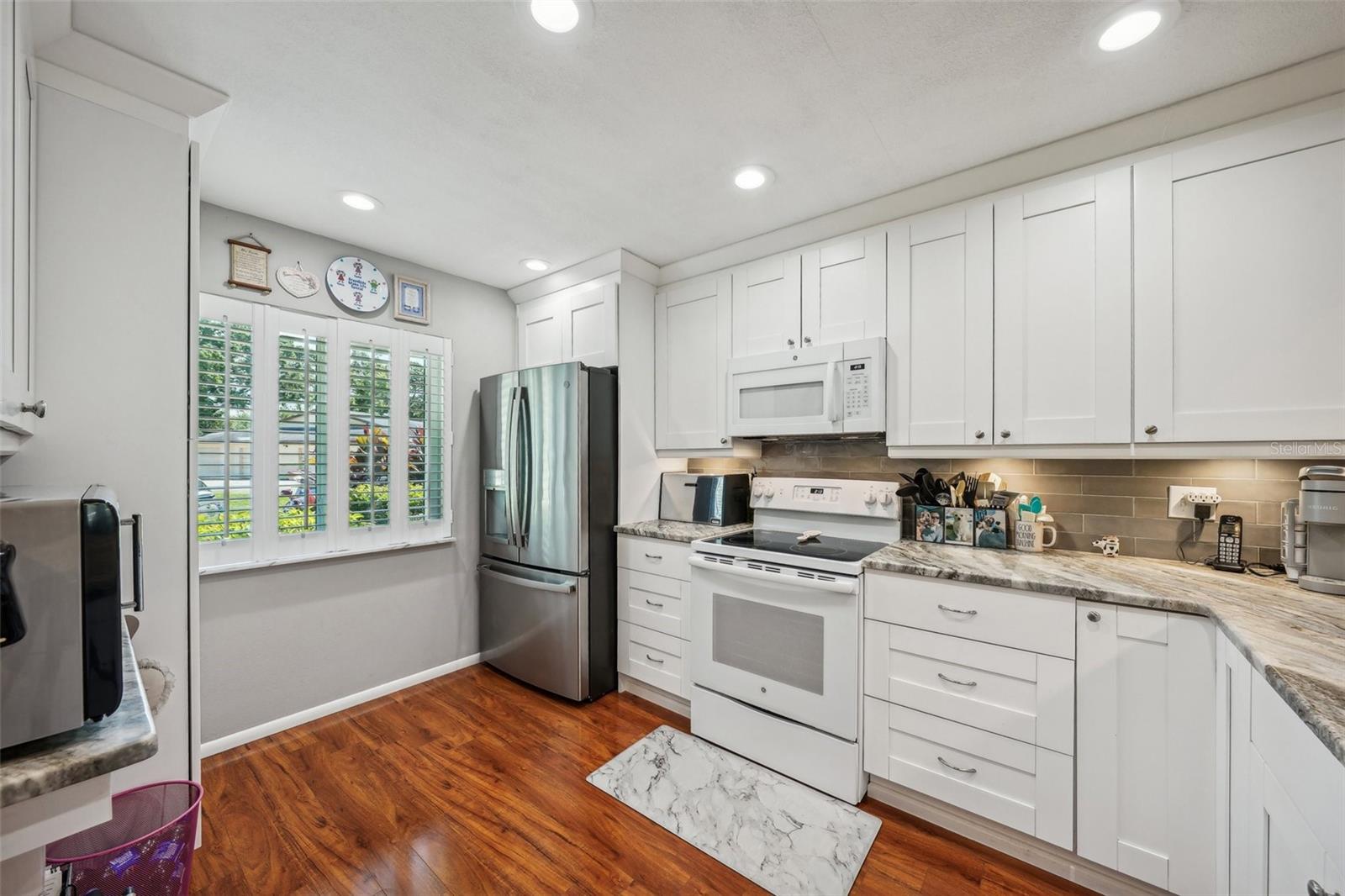 Plantation shutters on kitchen window.