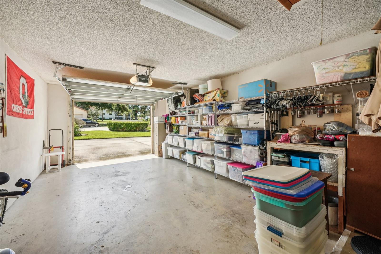 Garage view looking out to parking pad.