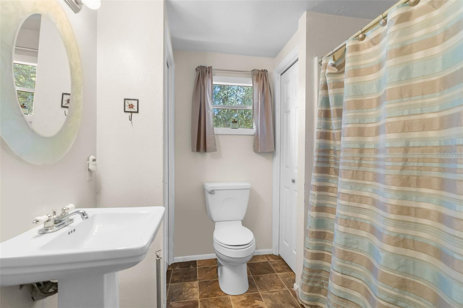 full bathroom with stand up shower