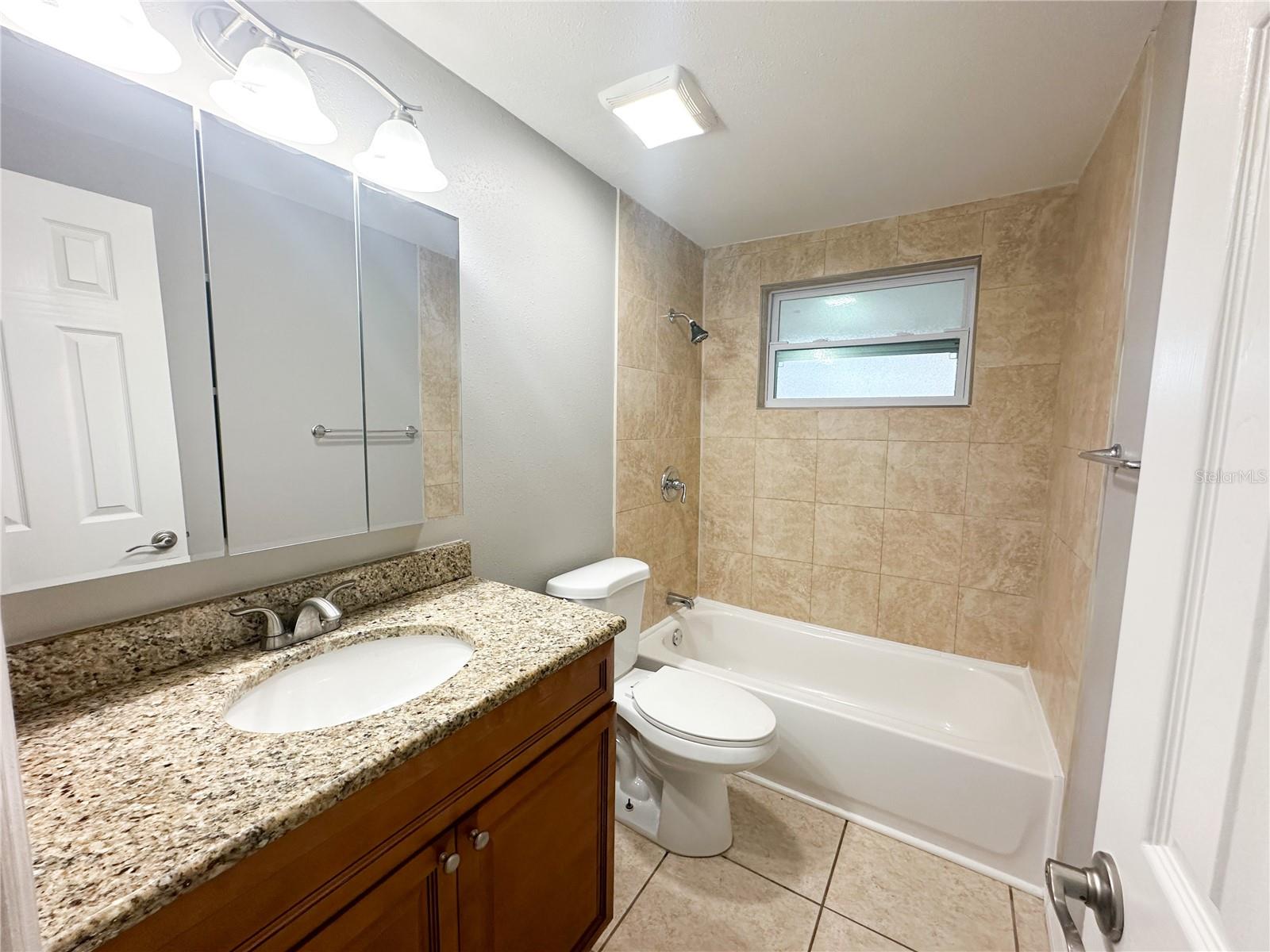 Main Bathroom with Granite & Tile