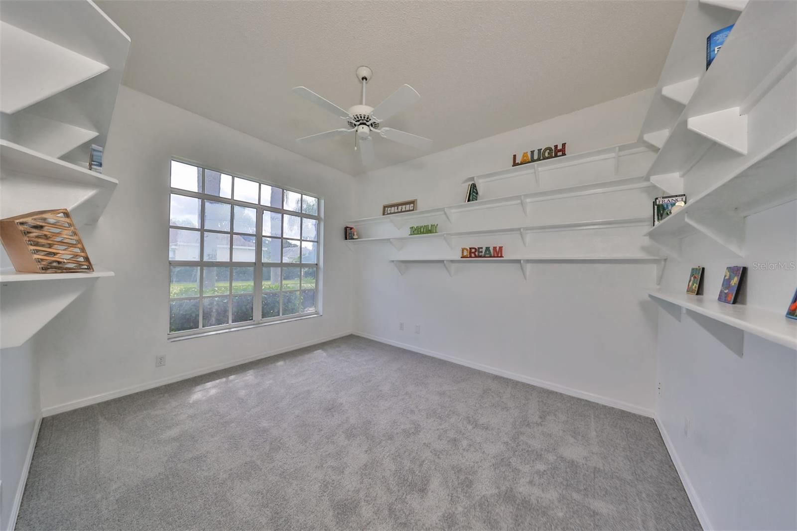 Front Office/Den/Study Shelving Add a Murphy Bed for More Guest Space