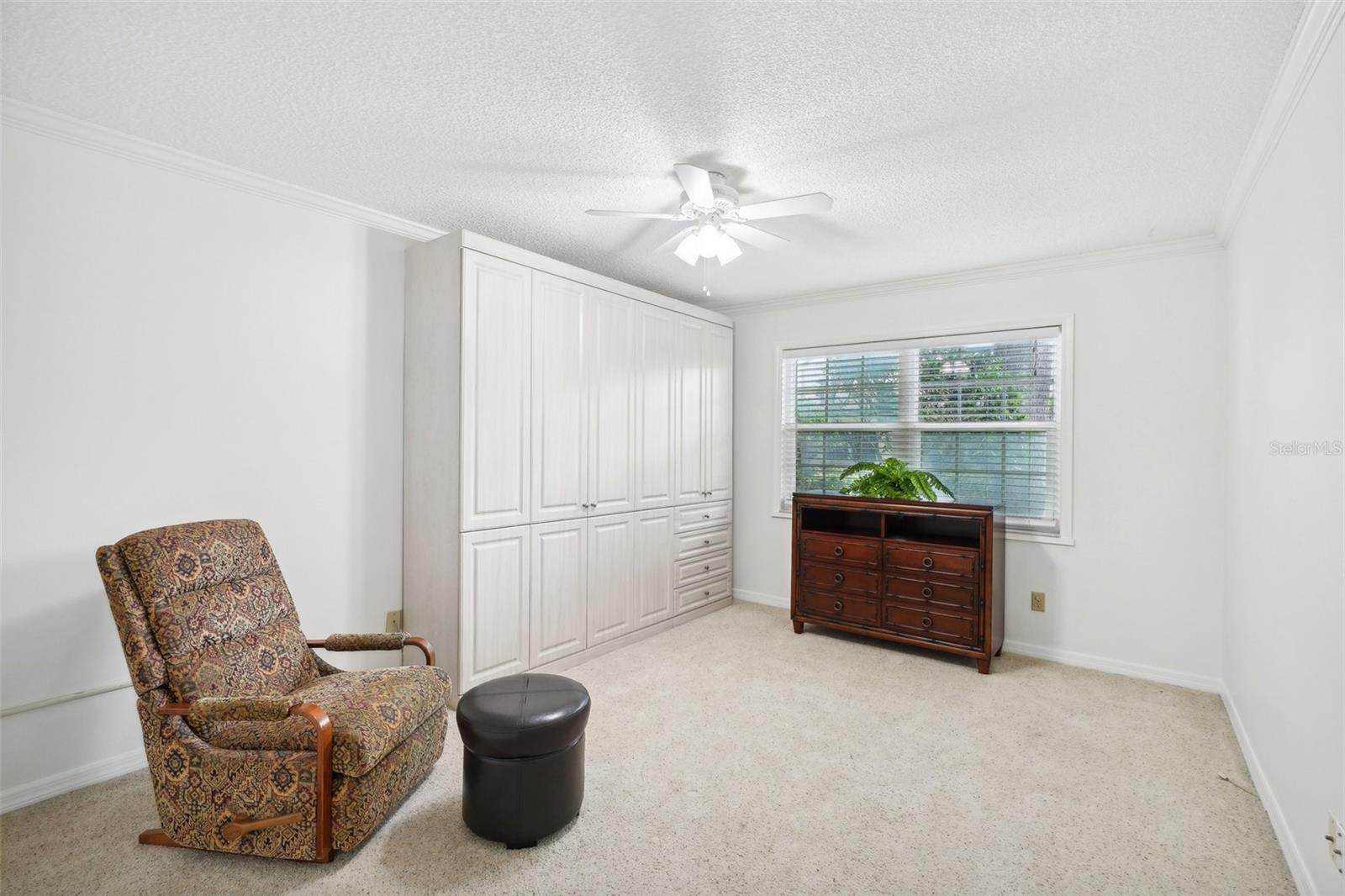 Guest bedroom with window view to front