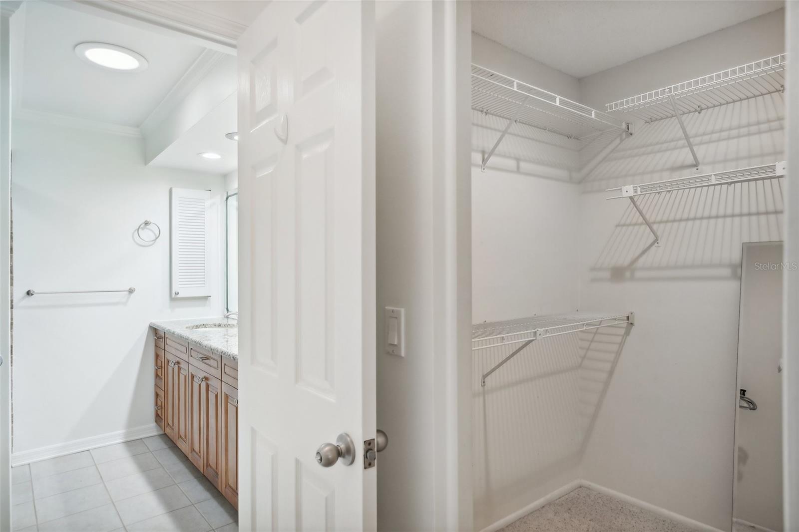 Walk in closet in front of master bathroom