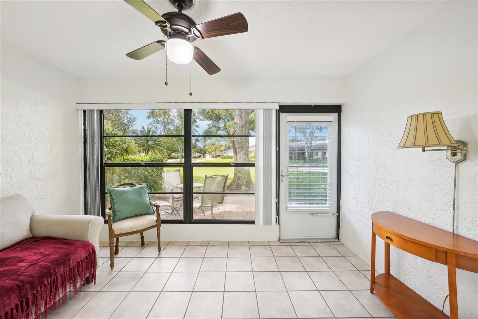 Back yard entrance and large windows