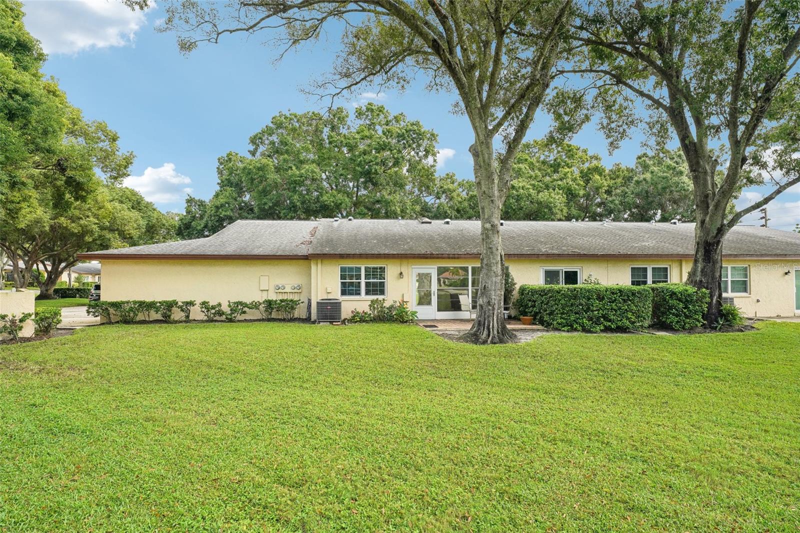 Back of home is on the corner with large manicured yard