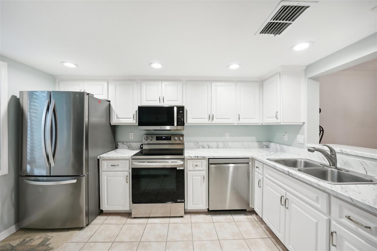 Bright kitchen with new appliances