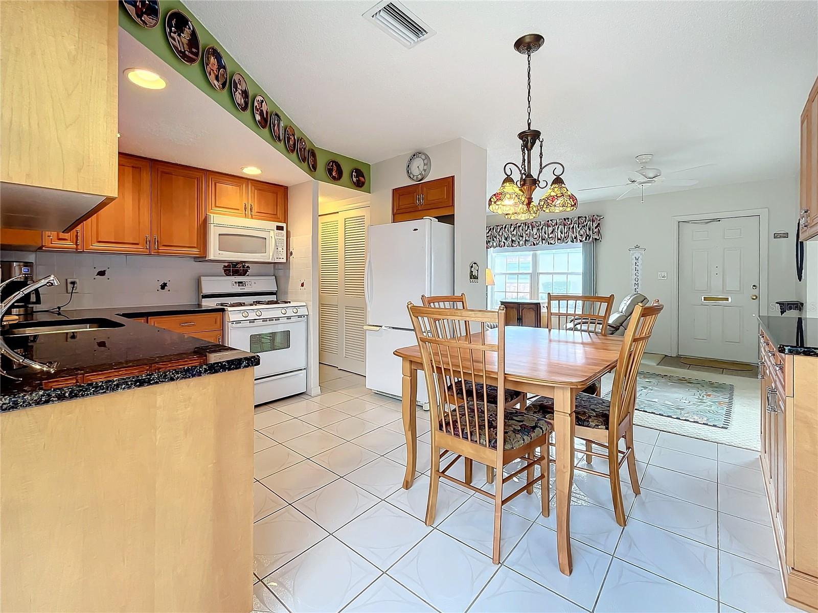 View of the kitchen toward the front entry door