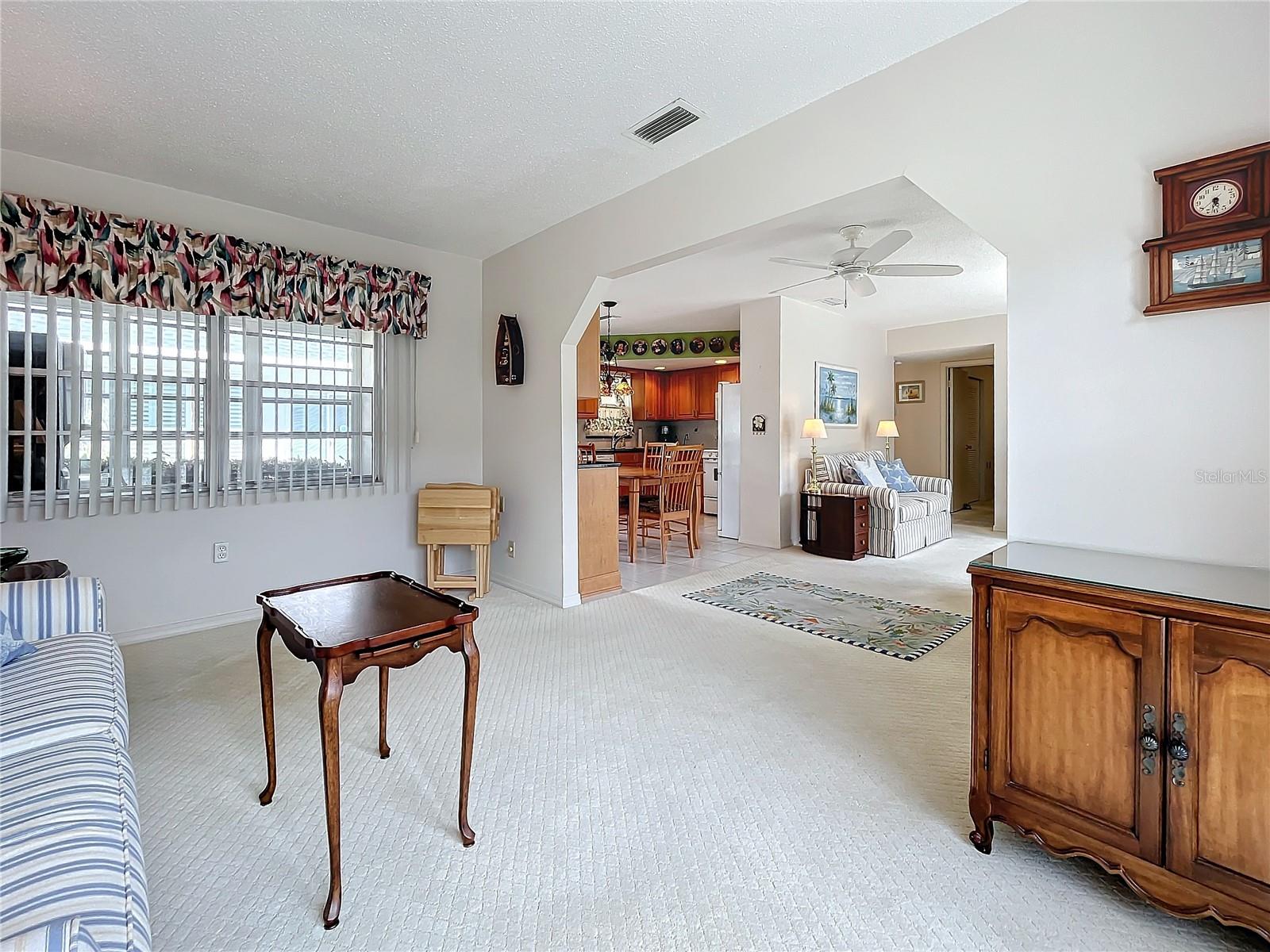 Another open view from the Den toward the kitchen and living room