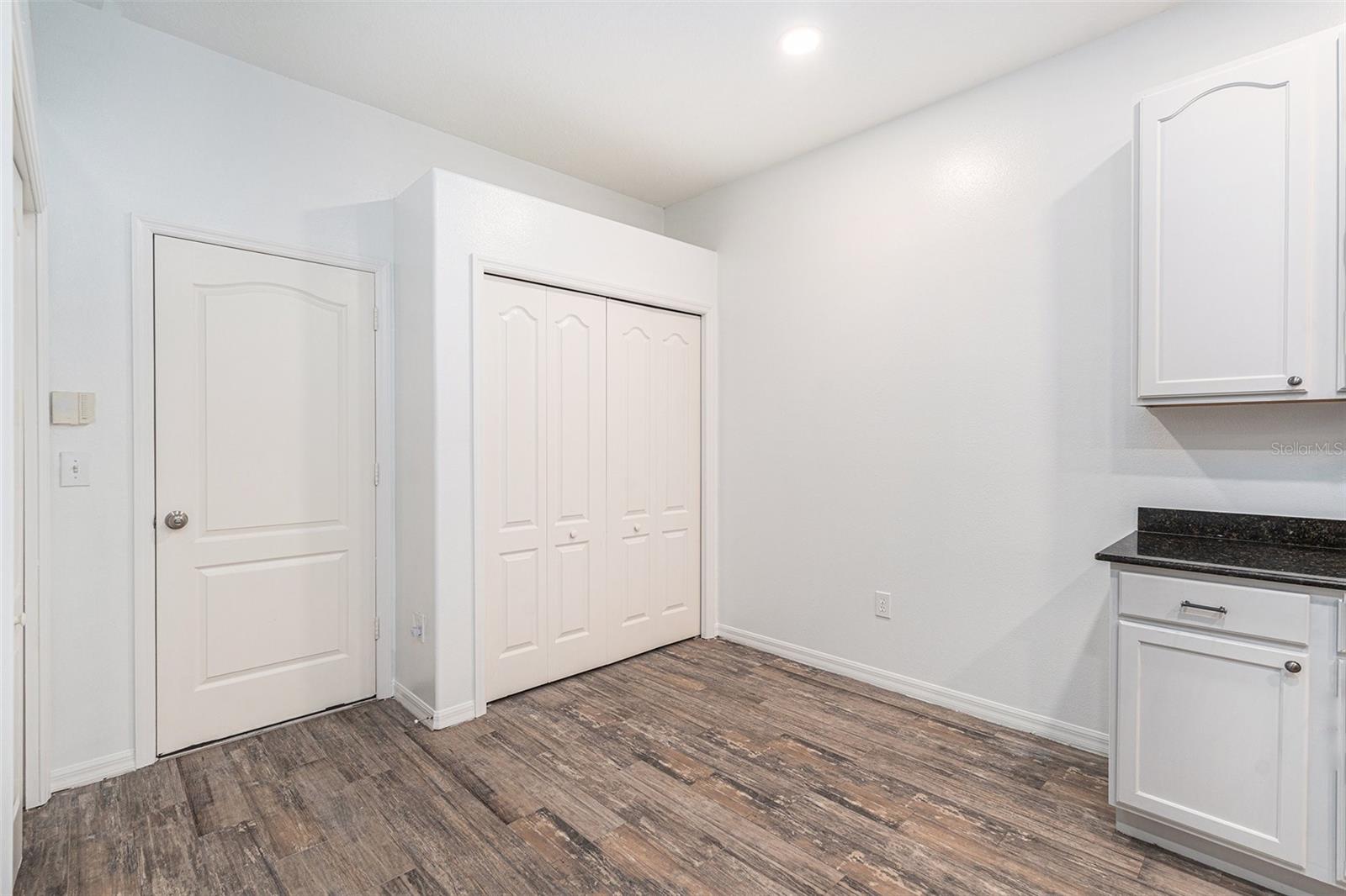 Double Door Pantry and Laundry area in Kitchen