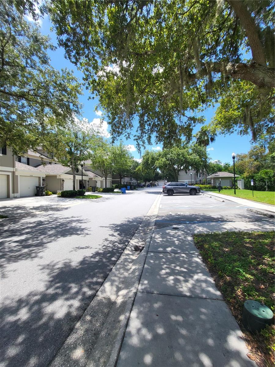 Well maintained community offers shady oaks and mature landscaping