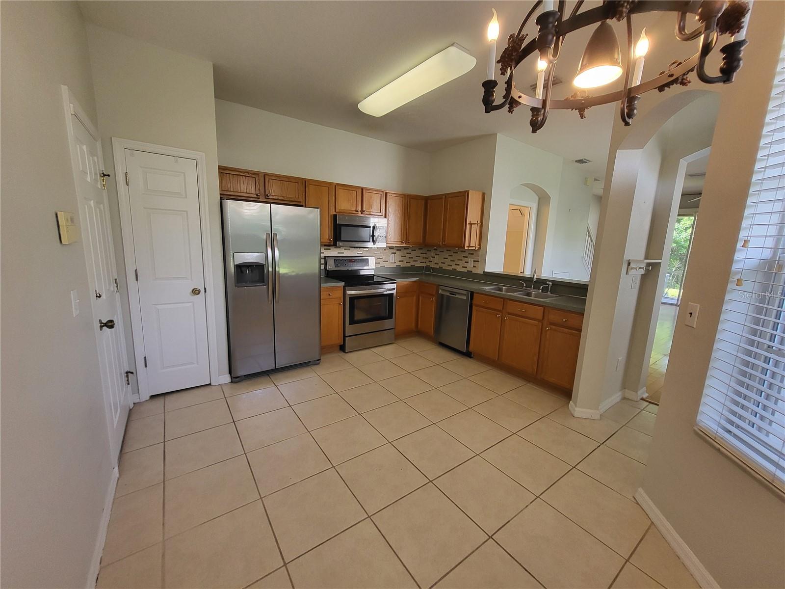 View of kitchen from dining nook