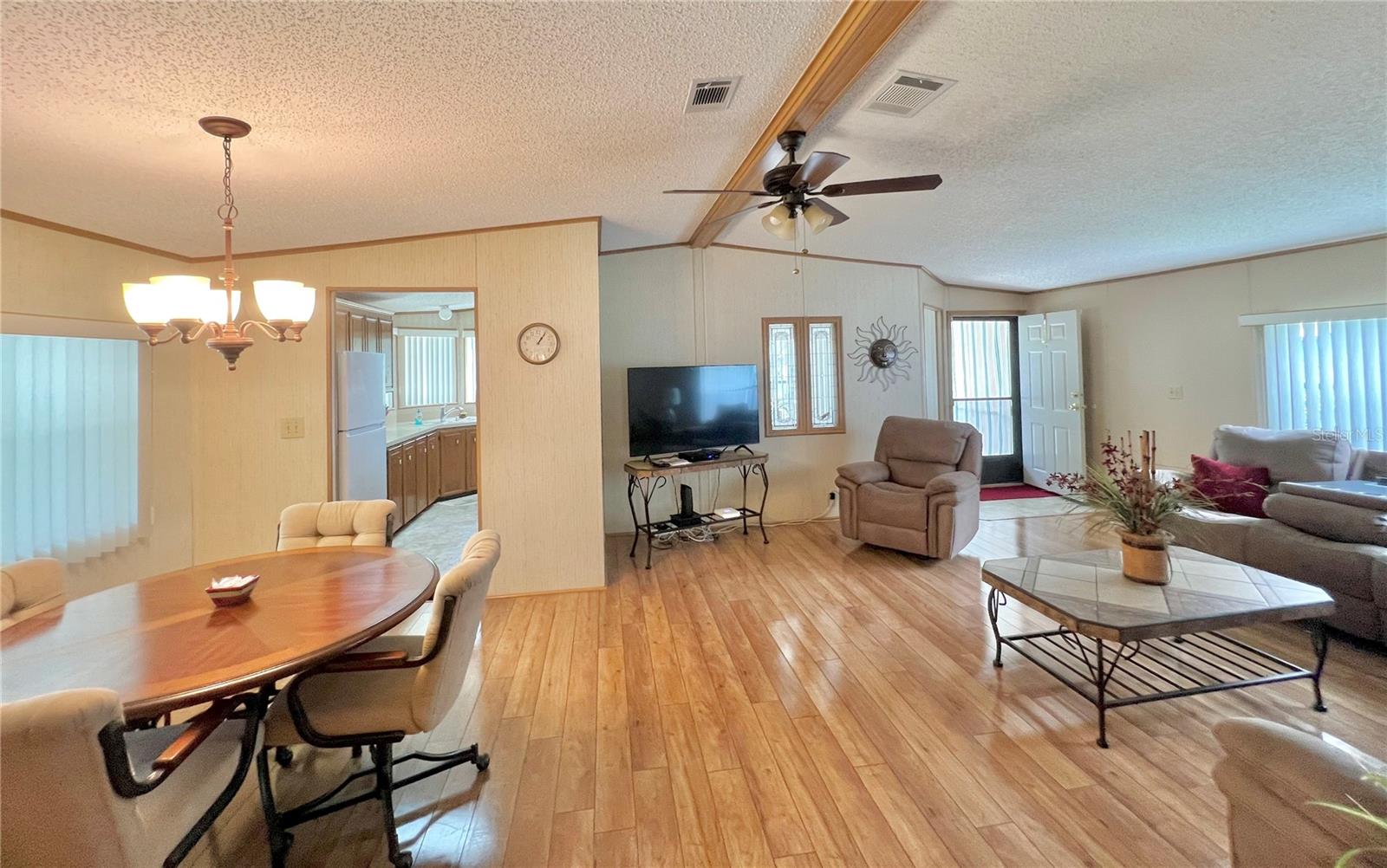 open floor plan with engineered hardwood floors.