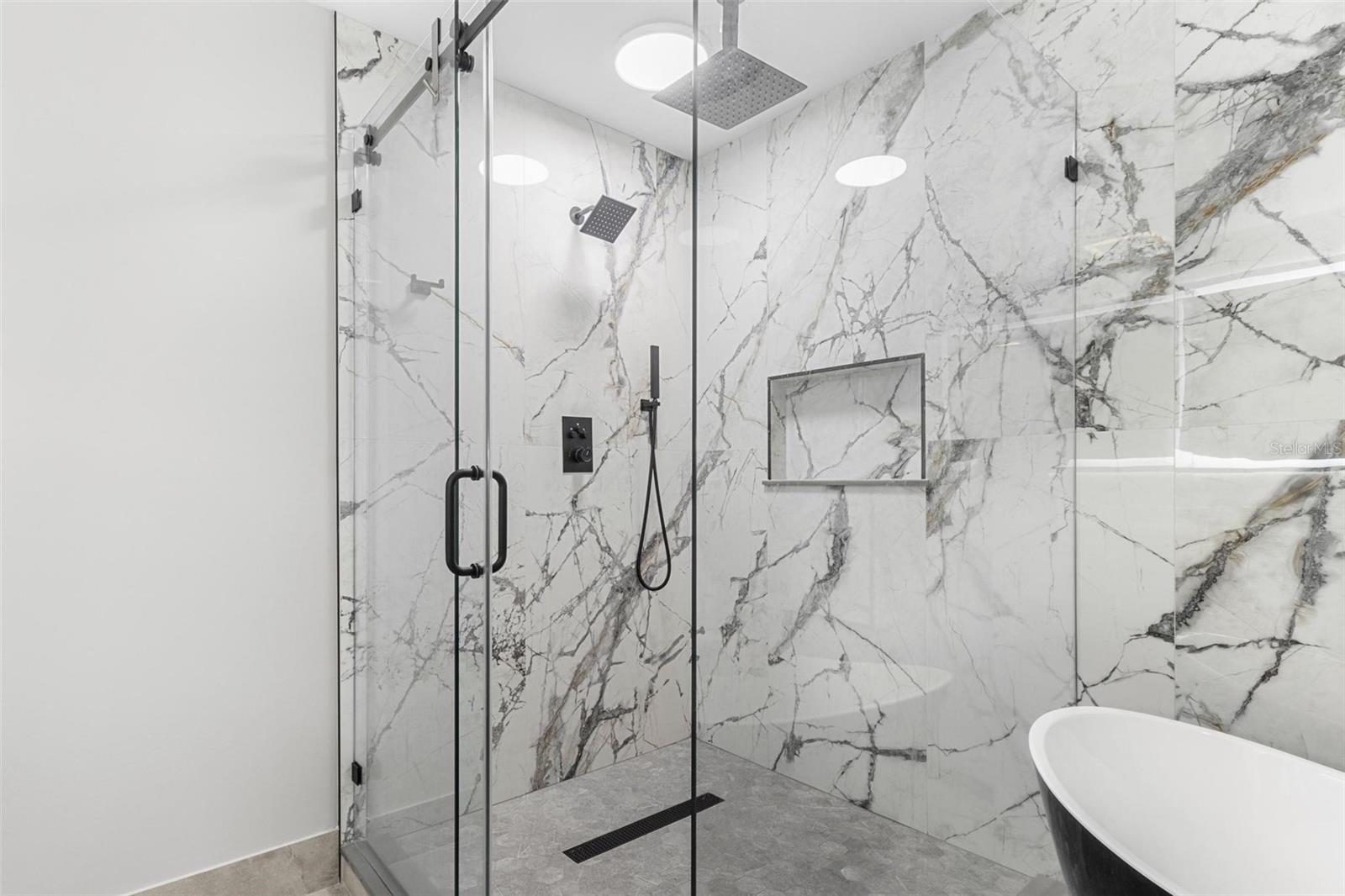 Contemporary & elegant shower - this renovation was just recently completed.