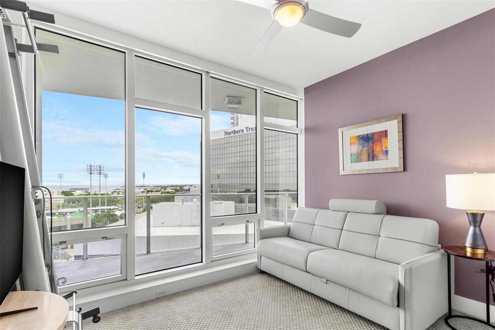 Second/guest bedroom is currently used as a sitting room with a "sleeper sofa".