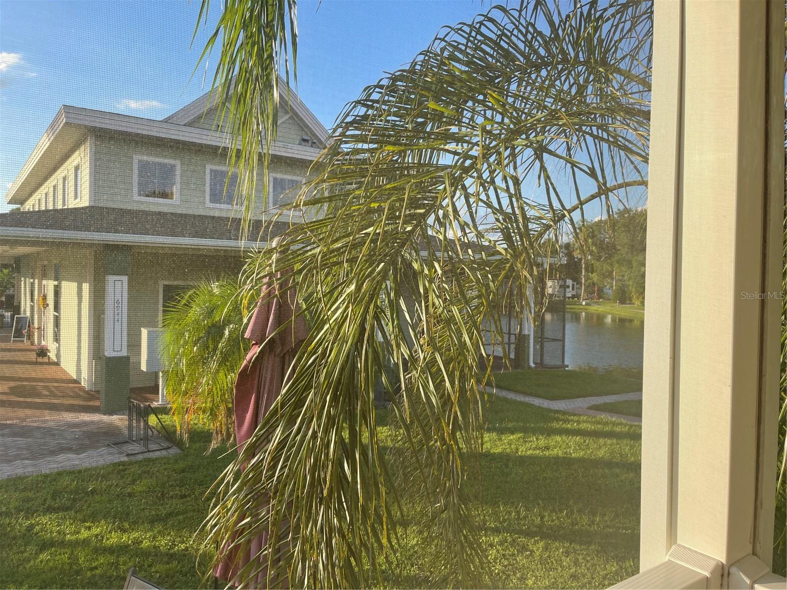 Screened patio faces the club house