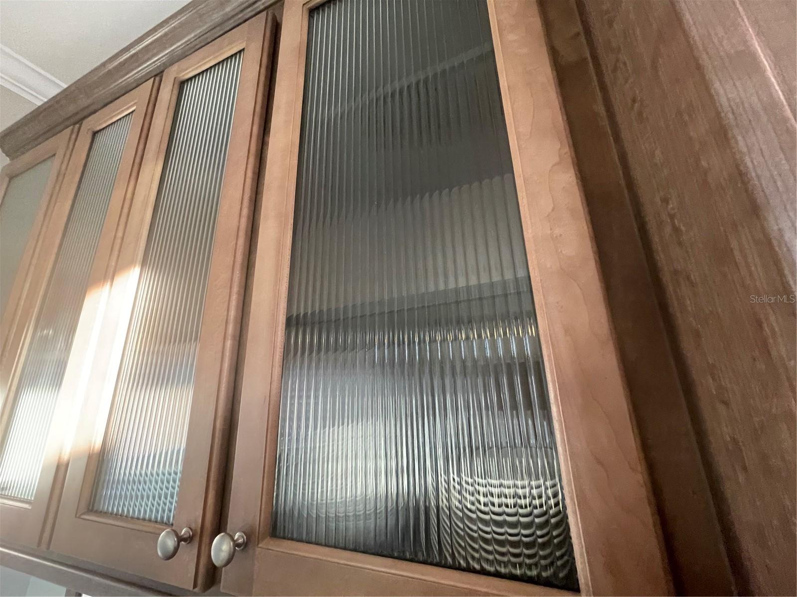 decorative glass cabinet doors in dining room