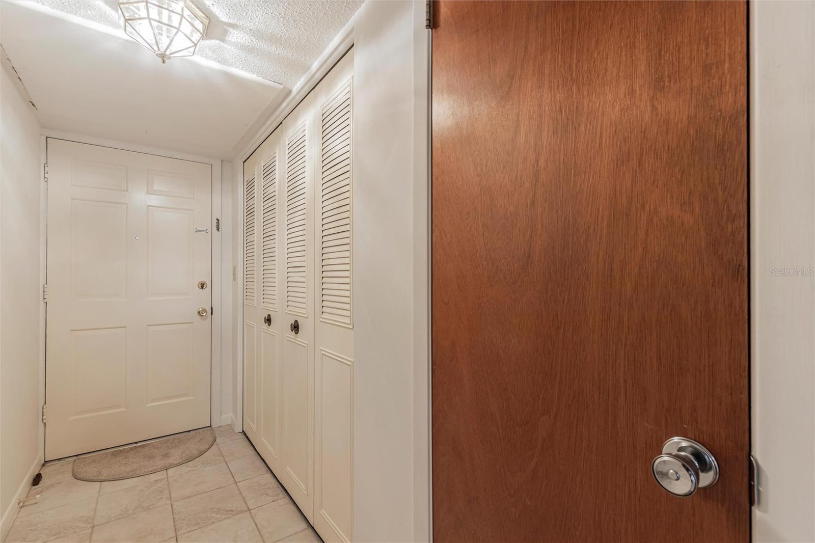 Front entry way with large storage closet