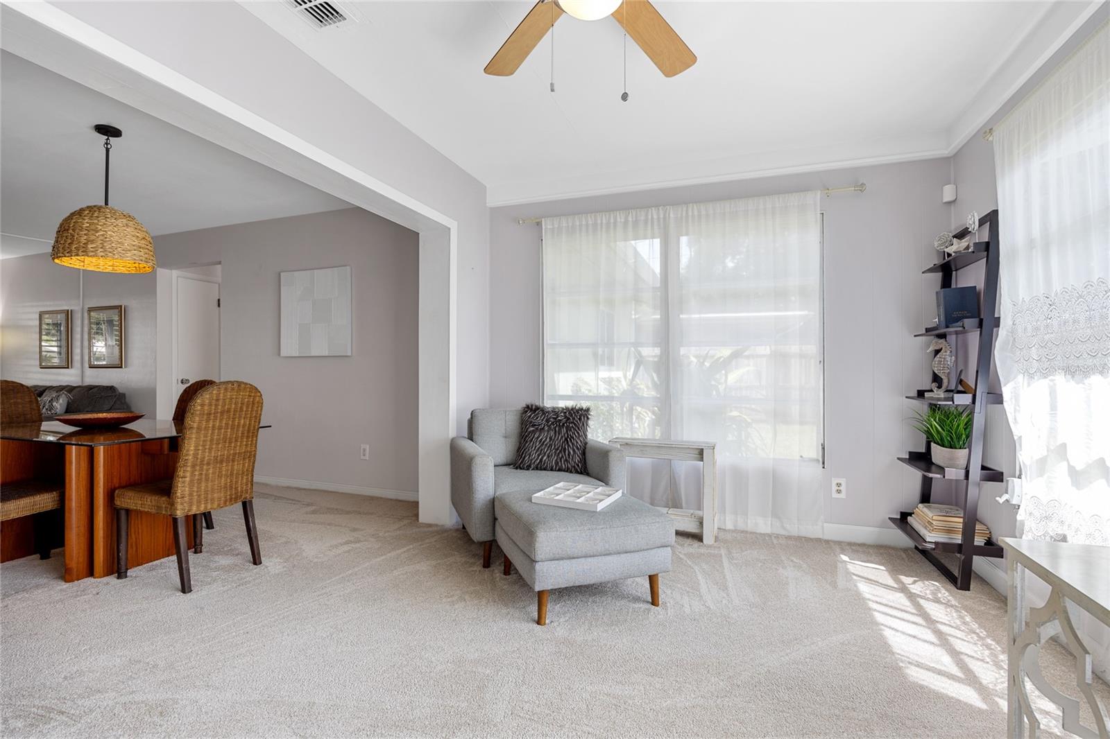 This Florida Room at the back of the home could be used as a quiet reading room, home office, workout space, play room or hobby space.