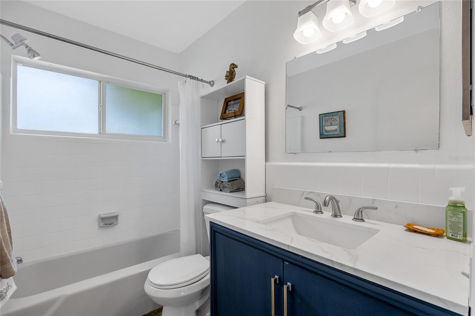 Bathroom #1 is convenient to both bedrooms and the living space and has a tub/shower combo