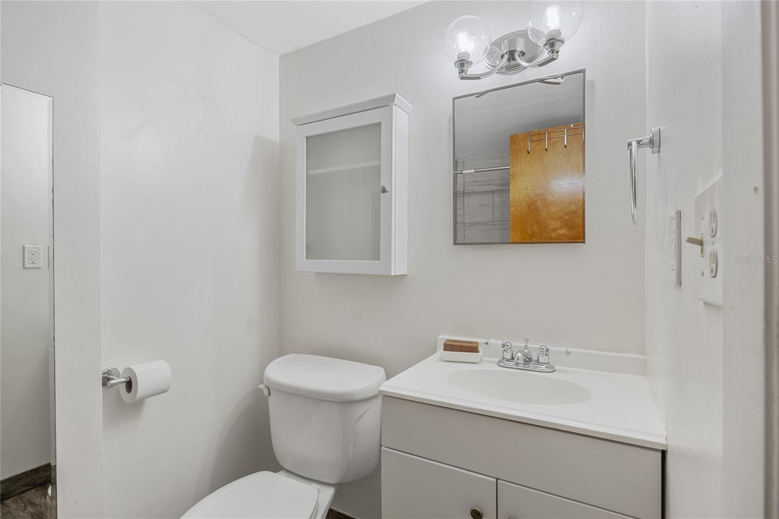 Bathroom #2 is convenient for cleaning up after a day at the beach or working in the yard.