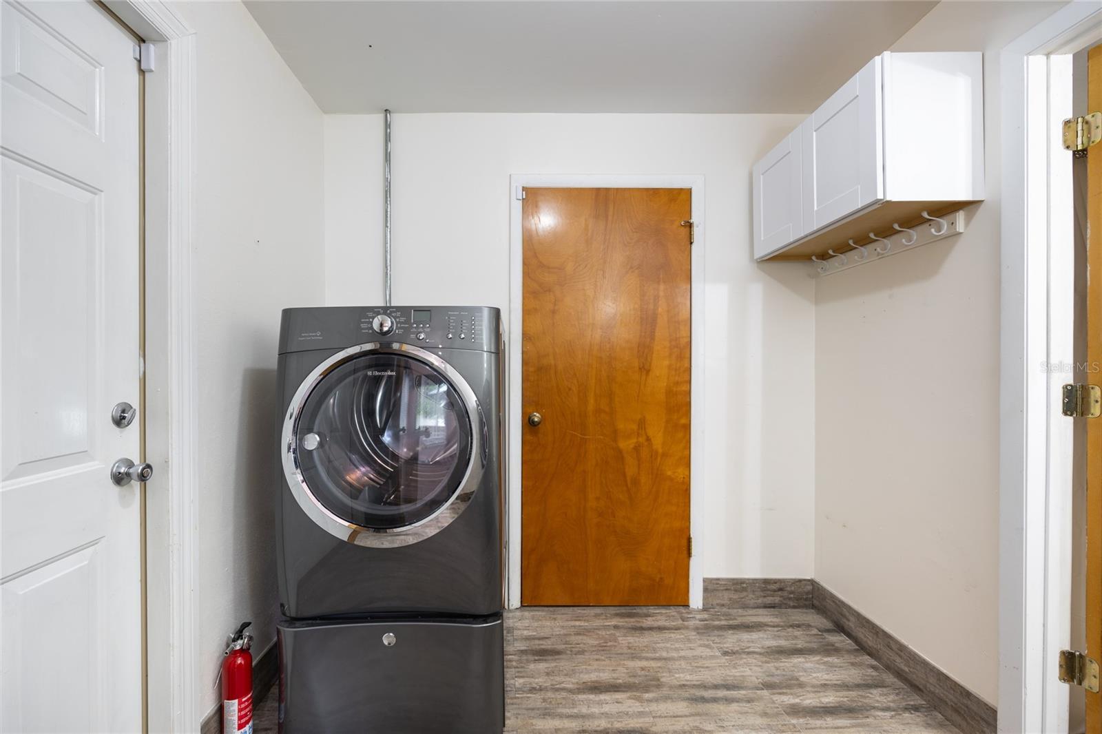 This Laundry Room is air conditioned sure to make the chore more enjoyable!