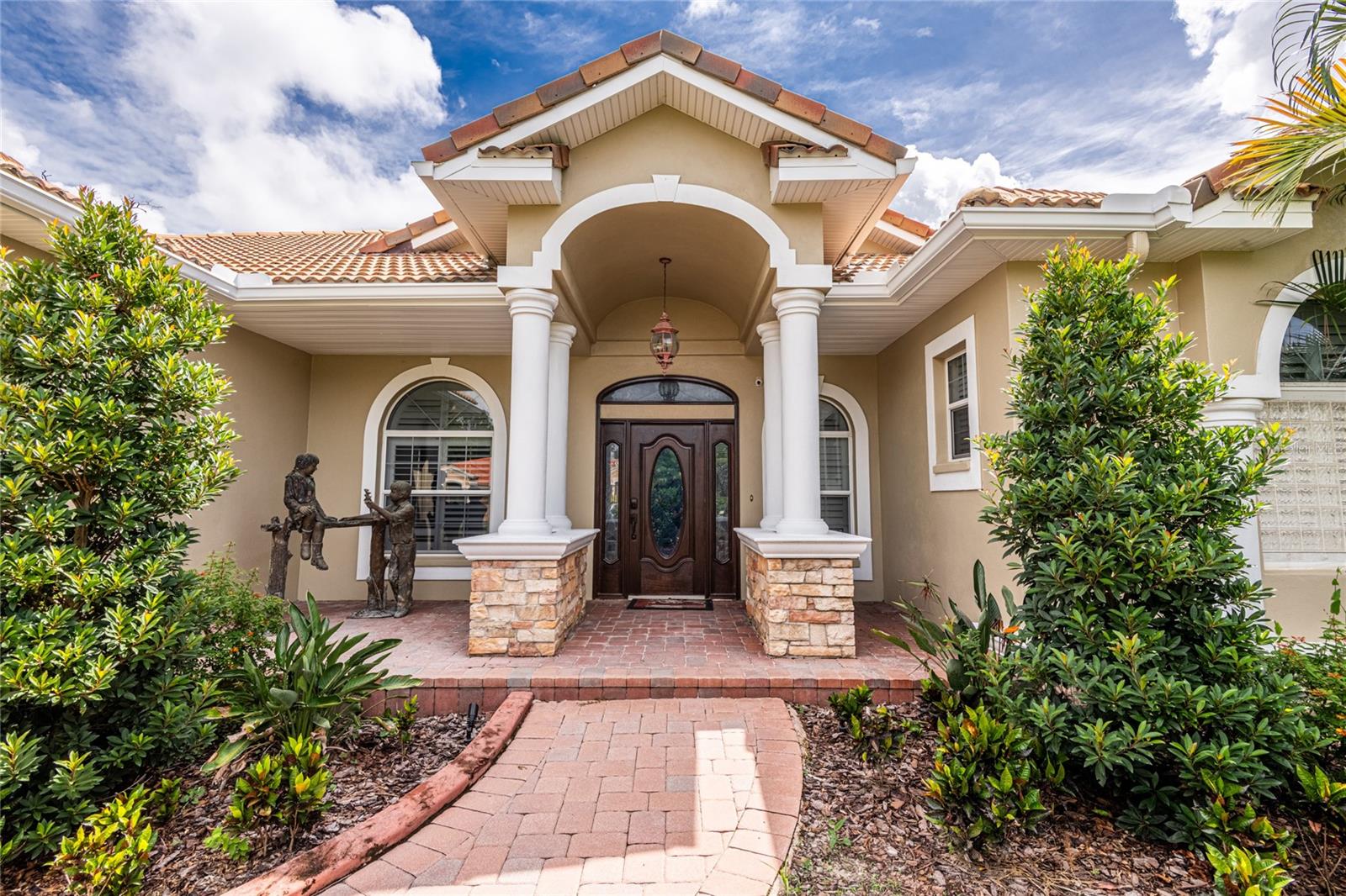 Front entrance with paver walkway