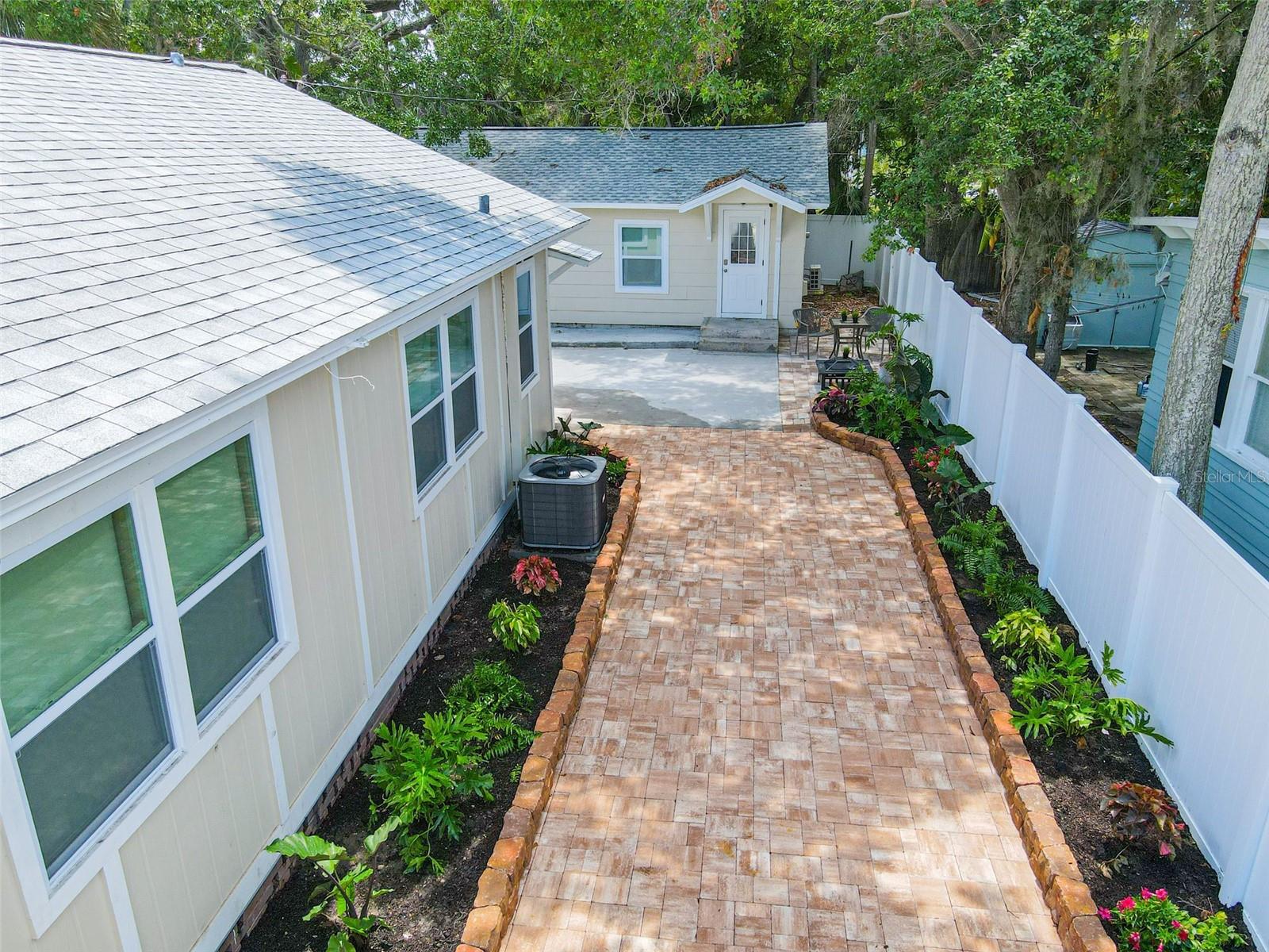 Walkway to Studios behind main home