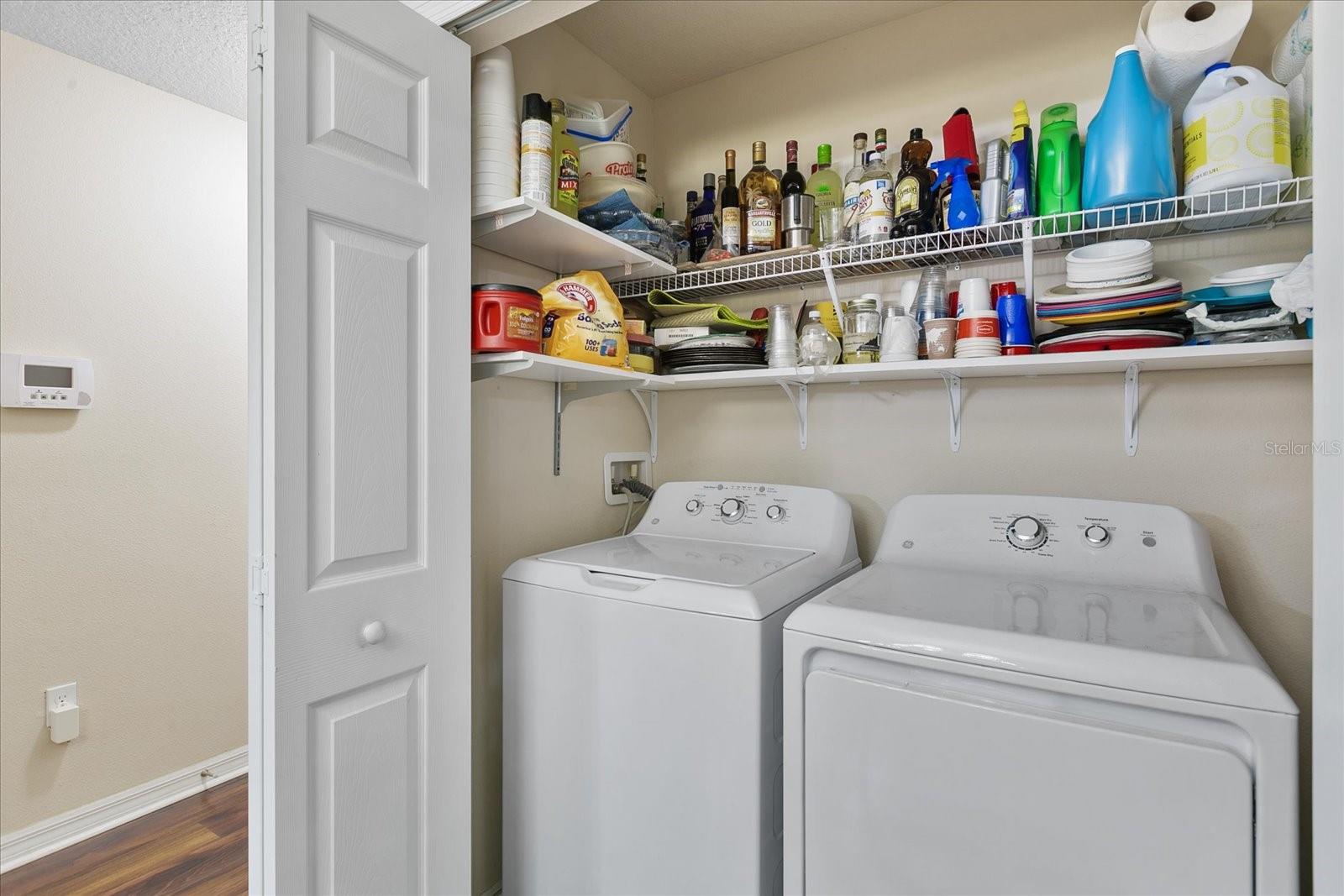 Interior laundry with full size washer and dryer