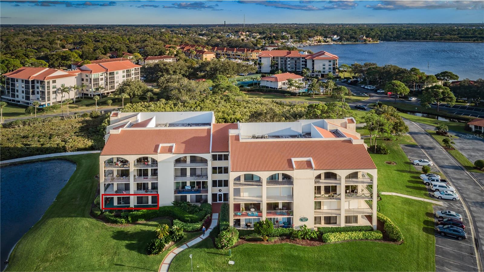 Quiet corner unit with gulf and pond views.