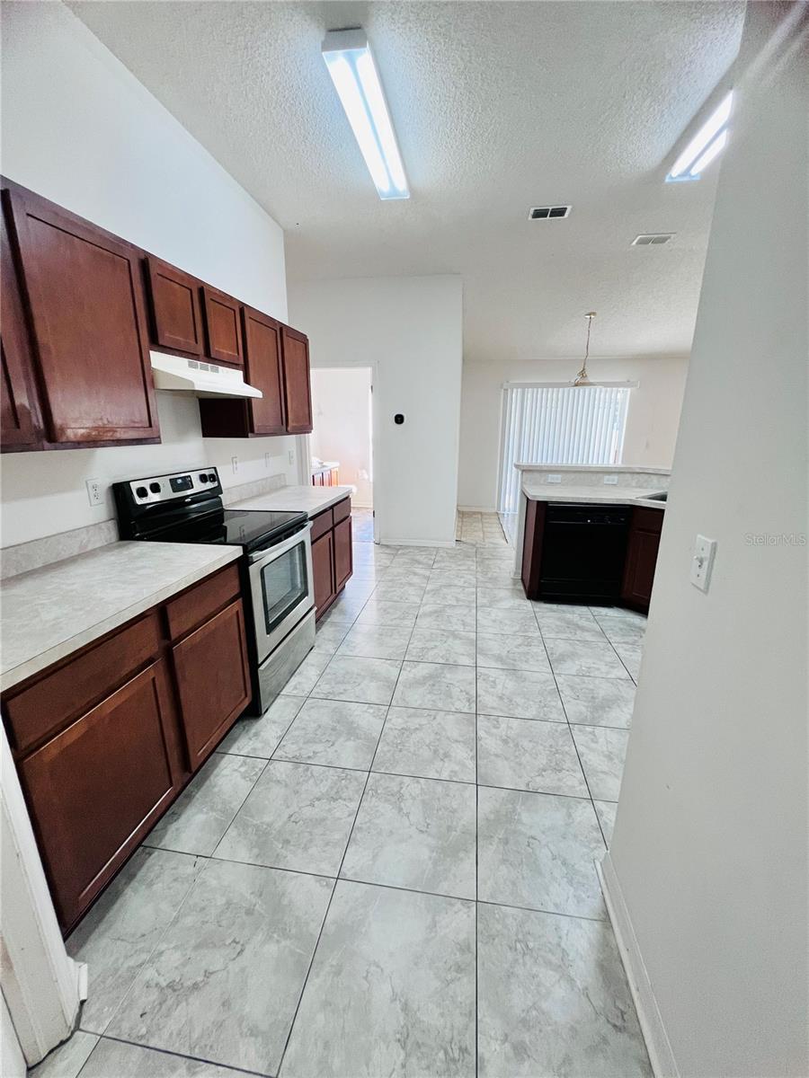 View of kitchen from dining room