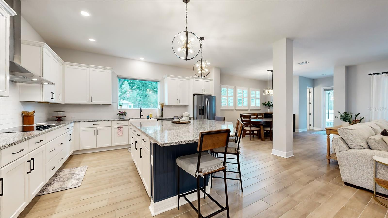 Gourmet style kitchen that opens up to dining area and living room