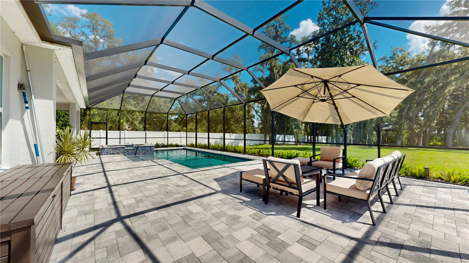 Patio with heated saltwater pool and spa